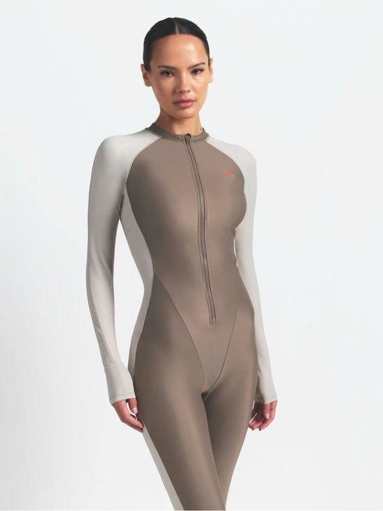 SKIMS Pants - SKIMS Two-Tone Zip-Front Performance Catsuit — Taupe & Off-White